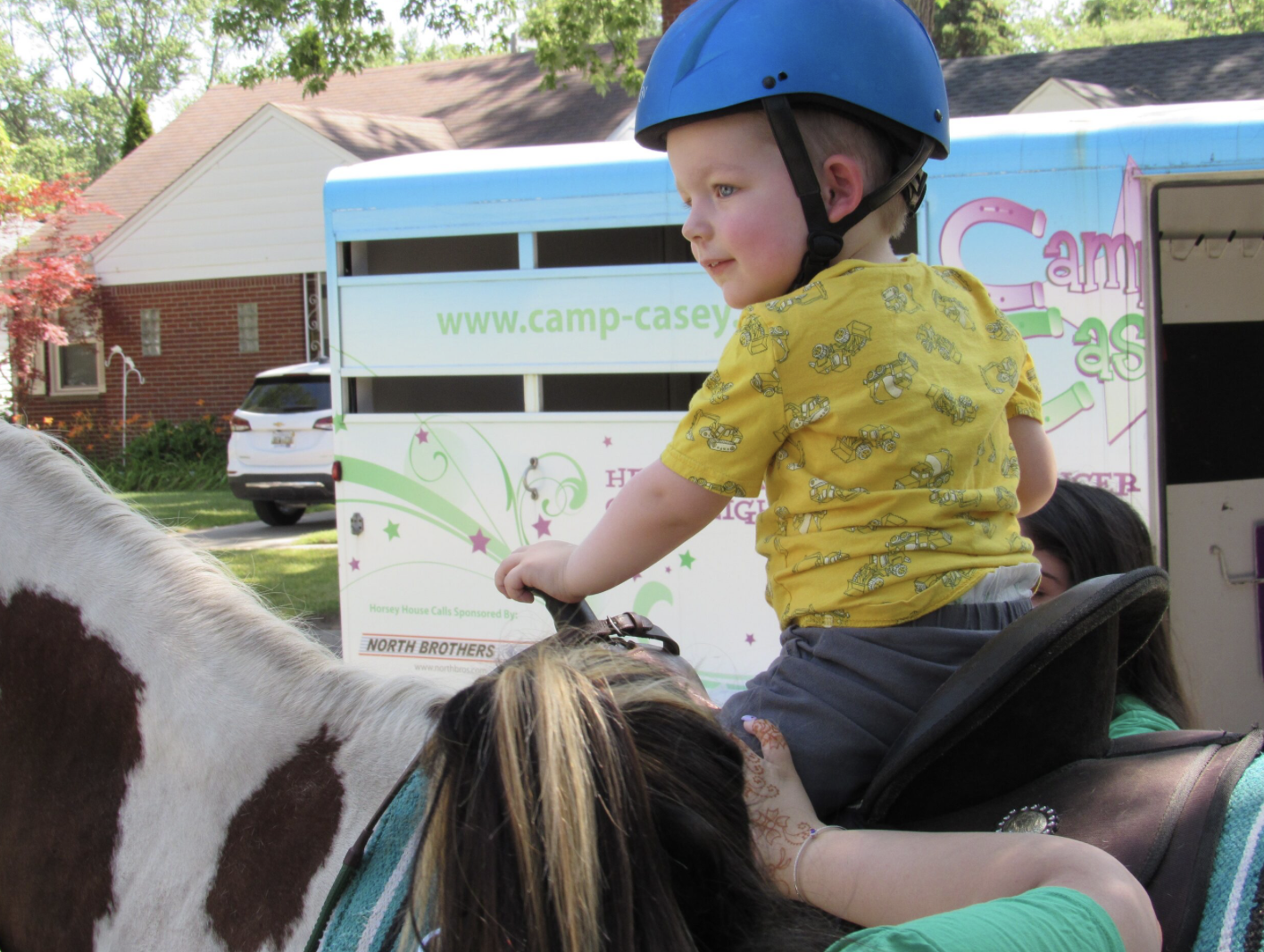 Camp Casey child riding on a horse